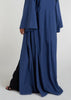 Waist pleats create a flowy silhouette, accompanied by wide sleeves and a stylish kimono style. The denim blue color adds to its overall appeal, while pockets provide functionality.