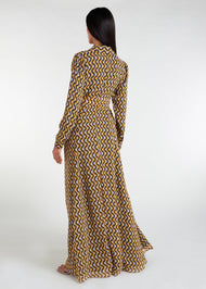 This Monochrome Maxi dress features a classic shirt-style design, making it a versatile and elegant choice for both formal and casual occasions. Its subtle colors and timeless pattern make it a perfect addition to your summer wardrobe. Yellow colour. Pockets.