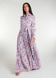 Featuring a vibrant floral pattern with an optional belt for styling, standard collars, discreet side pockets, and buttons all the way down, this maxi dress is perfect for any occasion. It is also suitable for nursing, making it a practical and stylish choice for any mother. Light blue base colour with pink roses and green thorns and leaves.