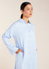 The Sky Blue Co-Ord Set features a light cotton feel and includes loose fit flared trousers paired with a long shirt. This versatile set allows for both open and closed styling, making it the perfect outfit for summer. To ensure a seamless look, we recommend wearing nude undergarments or a vest underneath, as light cotton fabrics tend to be sheer.